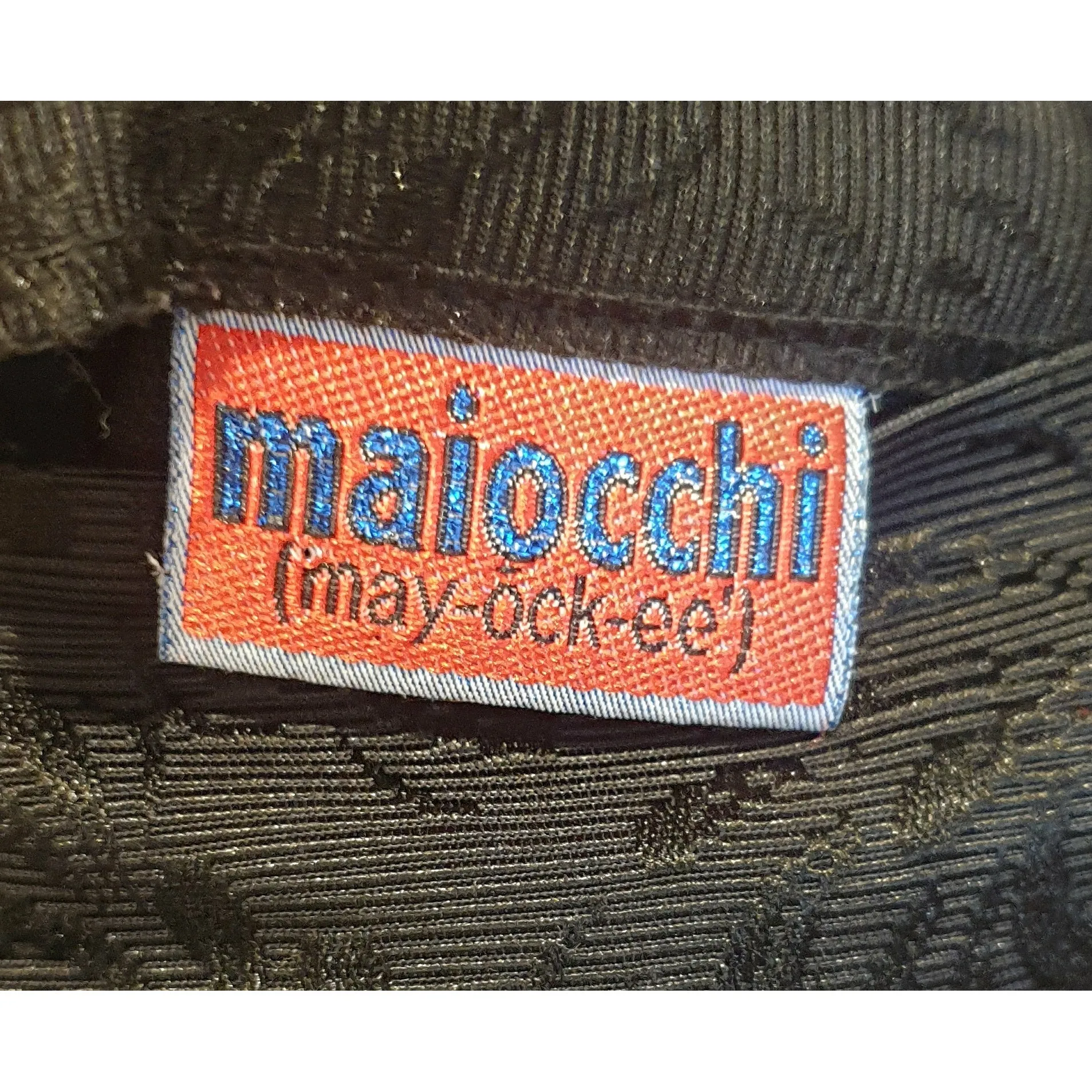 Maiocchi black pencil skirt with oriental trim detail size 12, best fits 10-12